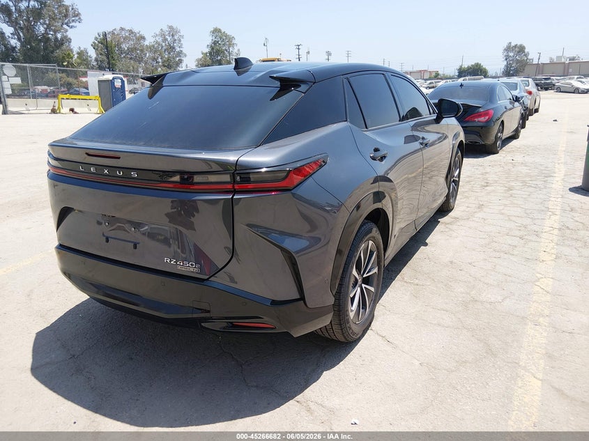 2023 Lexus Rz VIN JTJAAAAB6PA017510 IAAI salvage auction — SIDE, Salvage Title, sold $21,600 on 2026-07-16 (photo 4)