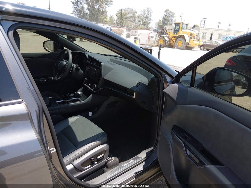 2023 Lexus Rz VIN JTJAAAAB6PA017510 IAAI salvage auction — SIDE, Salvage Title, sold $21,600 on 2026-07-16 (photo 5)