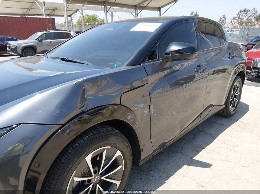 2023 Lexus Rz VIN JTJAAAAB6PA017510 IAAI salvage auction — SIDE, Salvage Title, sold $21,600 on 2026-07-16 (photo 6)