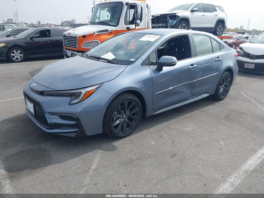 2026 Toyota Corolla VIN JTDBCMFE6T3141166 IAAI salvage auction — SIDE, Salvage (California), sold $11,700 on 2026-07-09 (photo 2)