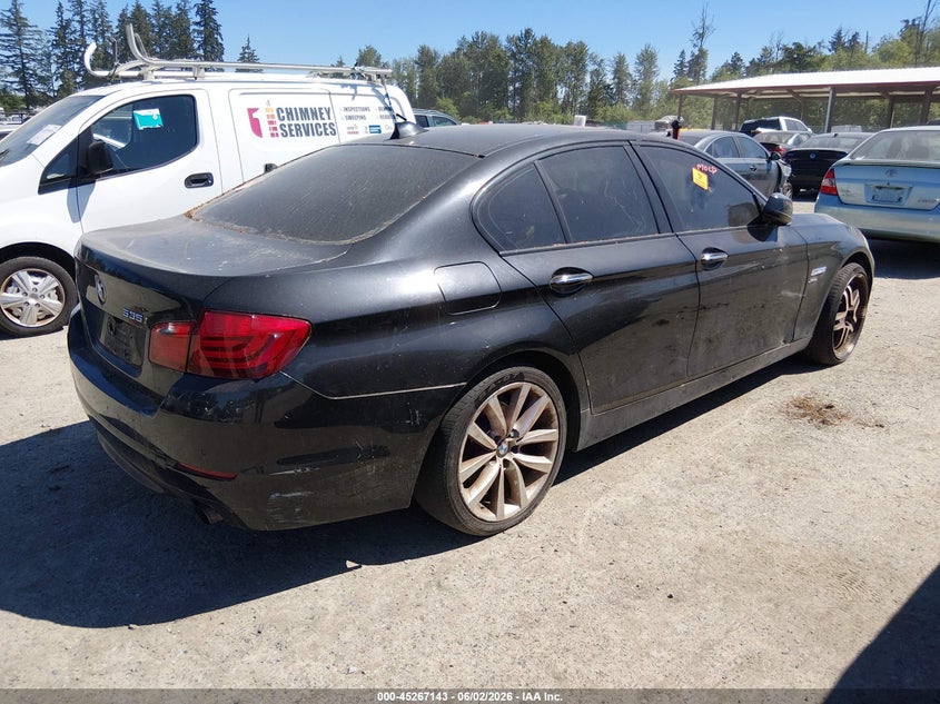 2011 BMW 5 series VIN WBAFU7C5XBC778870 IAAI salvage auction — NORMAL WEAR, Clear (Washington), sold $500 on 2026-07-22 (photo 4)
