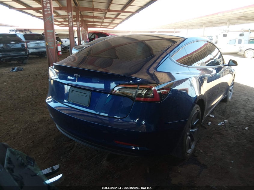 2023 Tesla Model 3 VIN 5YJ3E1EA8PF448990 IAAI salvage auction — LEFT FRONT, Salvage Title, sold $7,550 on 2026-07-09 (photo 4)