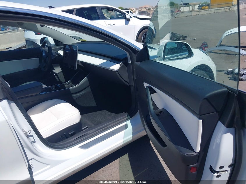 2020 Tesla Model 3 VIN 5YJ3E1EA9LF515669 IAAI salvage auction — REAR END, Salvage Title, sold $5,900 on 2026-07-10 (photo 5)