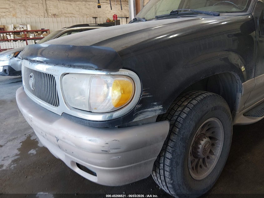 2000 Mercury Mountaineer VIN 4M2ZU76E2YUJ39911 IAAI salvage auction — NORMAL WEAR, Original (Alaska), sold $25 on 2026-07-17 (photo 6)