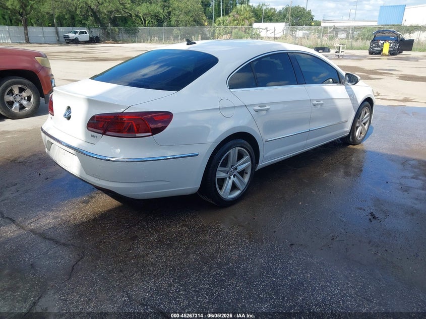 2014 Volkswagen Cc VIN WVWBN7AN0EE526362 IAAI salvage auction — NORMAL WEAR, Clear (Florida), sold $250 on 2026-07-22 (photo 4)