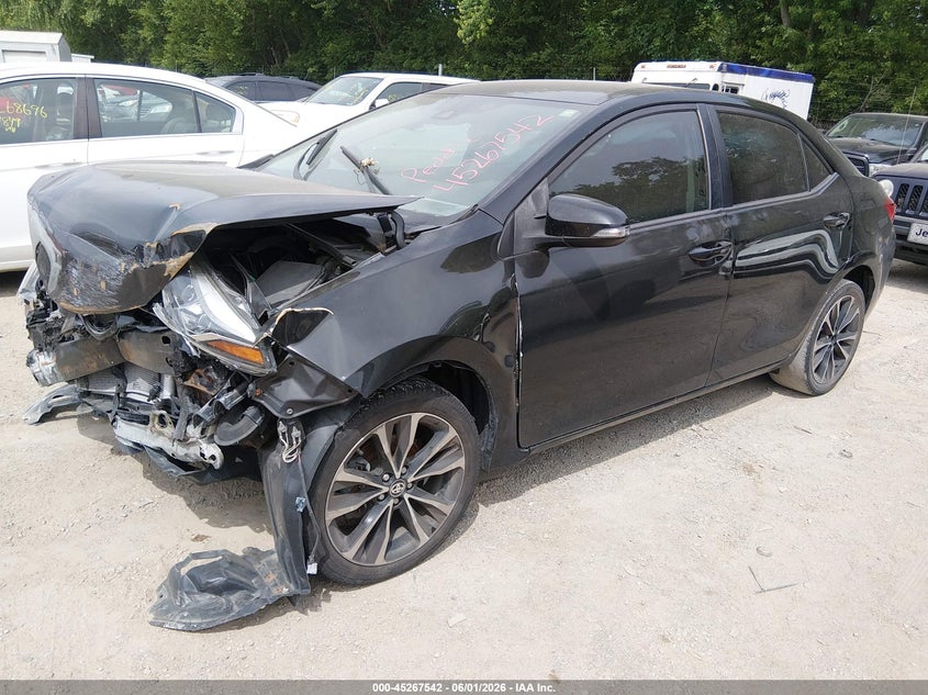 2019 Toyota Corolla VIN 5YFBURHE5KP856565 IAAI salvage auction — NORMAL WEAR, Rebuilt (Indiana), sold $1,700 on 2026-07-15 (photo 2)