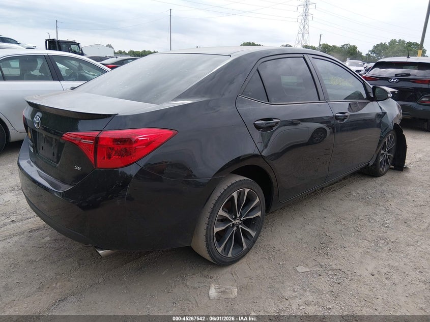 2019 Toyota Corolla VIN 5YFBURHE5KP856565 IAAI salvage auction — NORMAL WEAR, Rebuilt (Indiana), sold $1,700 on 2026-07-15 (photo 4)