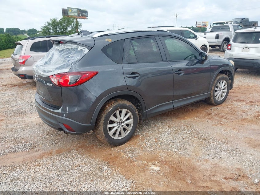 2015 Mazda Cx-5 VIN JM3KE2CY3F0529594 IAAI salvage auction — HAIL, Salvage Title, sold $2,550 on 2026-07-20 (photo 4)