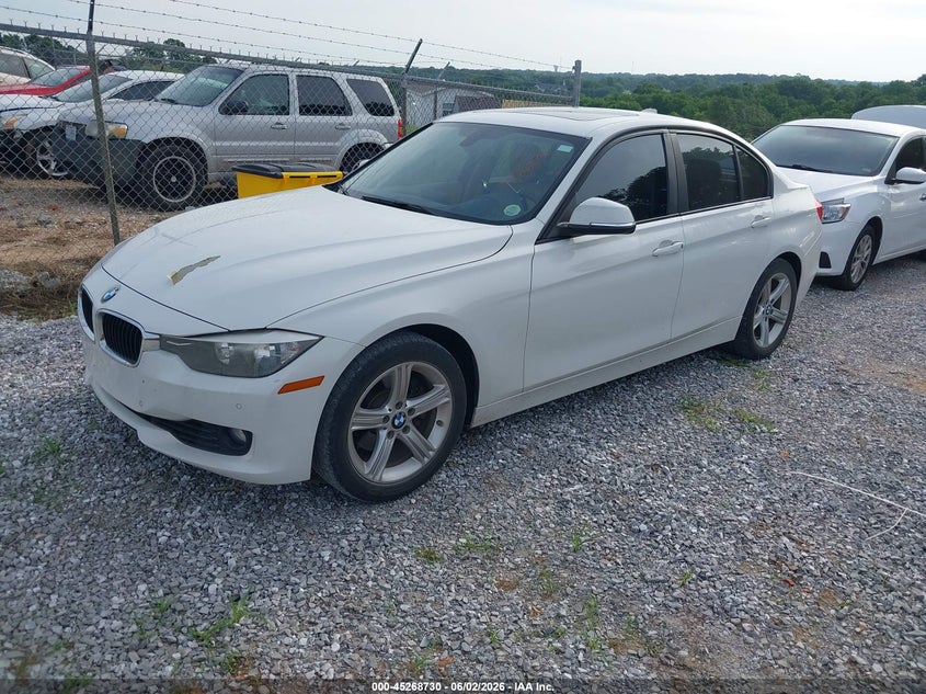 2014 BMW 3er VIN WBA3A5G51ENP31150 IAAI salvage auction — HAIL, Salvage Title, sold $2,000 on 2026-07-06 (photo 2)