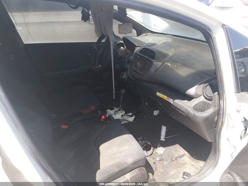 2009 Honda Fit VIN JHMGE88689S023808 IAAI salvage auction — NORMAL WEAR, Clear - Public Restricted (Oklahoma), sold $375 on 2026-07-08 (photo 5)