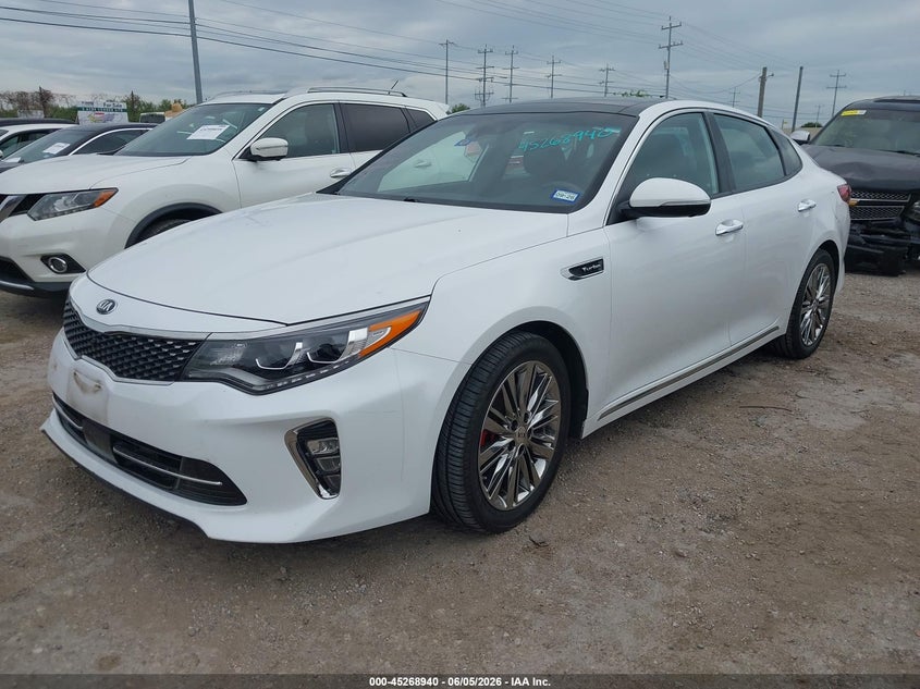 2018 Kia Optima VIN 5XXGV4L20JG204687 IAAI salvage auction — SIDE, Salvage Title, sold $3,550 on 2026-07-29 (photo 2)