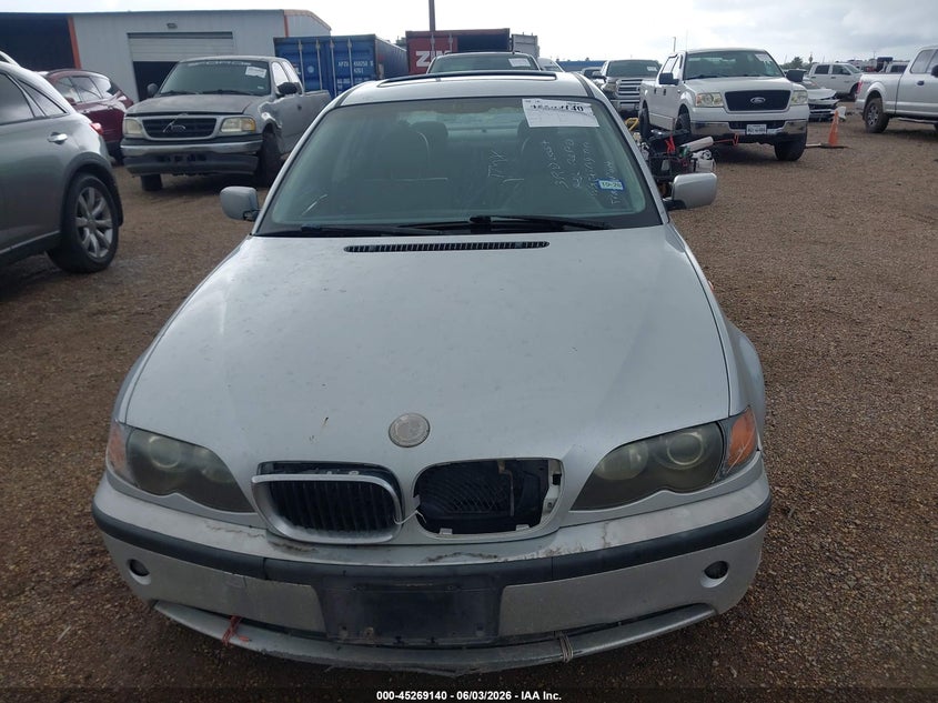 2002 BMW 3 series VIN WBAEV33492KL77910 IAAI salvage auction — NORMAL WEAR, Original (Texas), sold $300 on 2026-07-08 (photo 6)