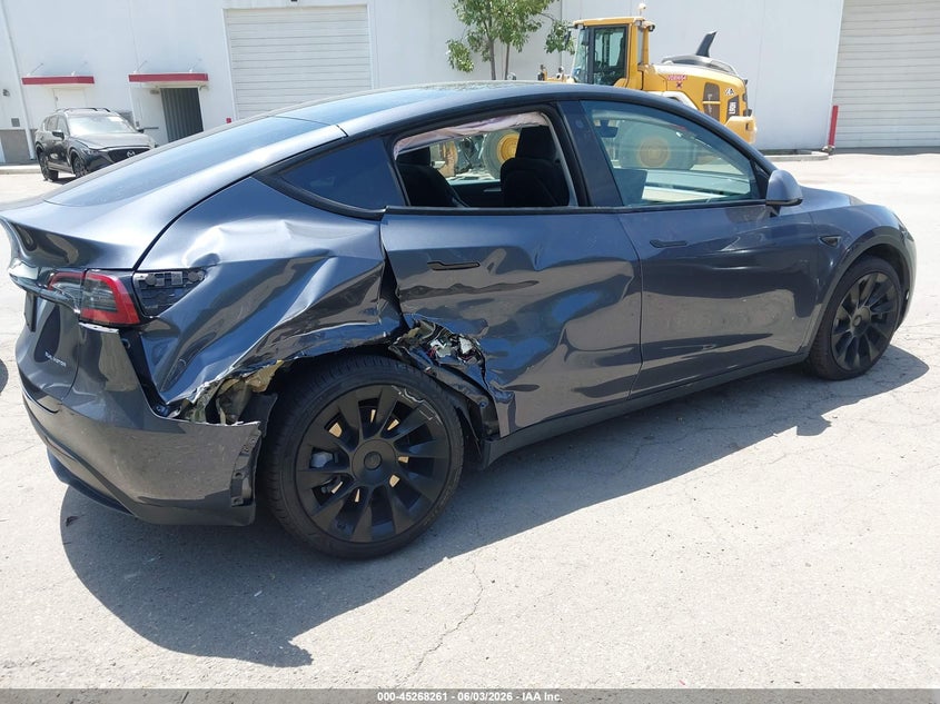 2023 Tesla Model y VIN 7SAYGDEE3PA057217 IAAI salvage auction — RIGHT REAR, Salvage (California), sold $10,550 on 2026-07-06 (photo 4)