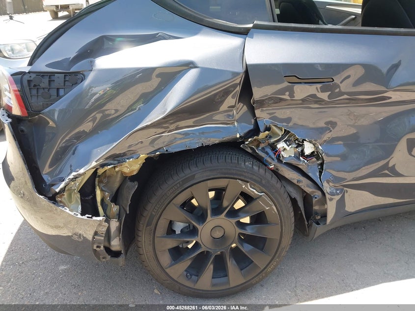 2023 Tesla Model y VIN 7SAYGDEE3PA057217 IAAI salvage auction — RIGHT REAR, Salvage (California), sold $10,550 on 2026-07-06 (photo 6)