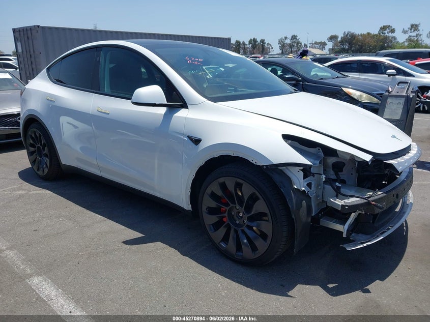 2023 Tesla Model y VIN 7SAYGDEFXPF889701 IAAI salvage auction — LEFT FRONT, Salvage Title, sold $13,100 on 2026-07-10 (photo 1)