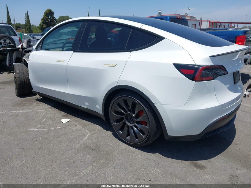 2023 Tesla Model y VIN 7SAYGDEFXPF889701 IAAI salvage auction — LEFT FRONT, Salvage Title, sold $13,100 on 2026-07-10 (photo 3)