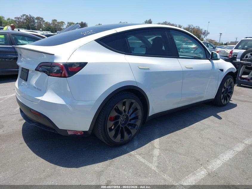 2023 Tesla Model y VIN 7SAYGDEFXPF889701 IAAI salvage auction — LEFT FRONT, Salvage Title, sold $13,100 on 2026-07-10 (photo 4)
