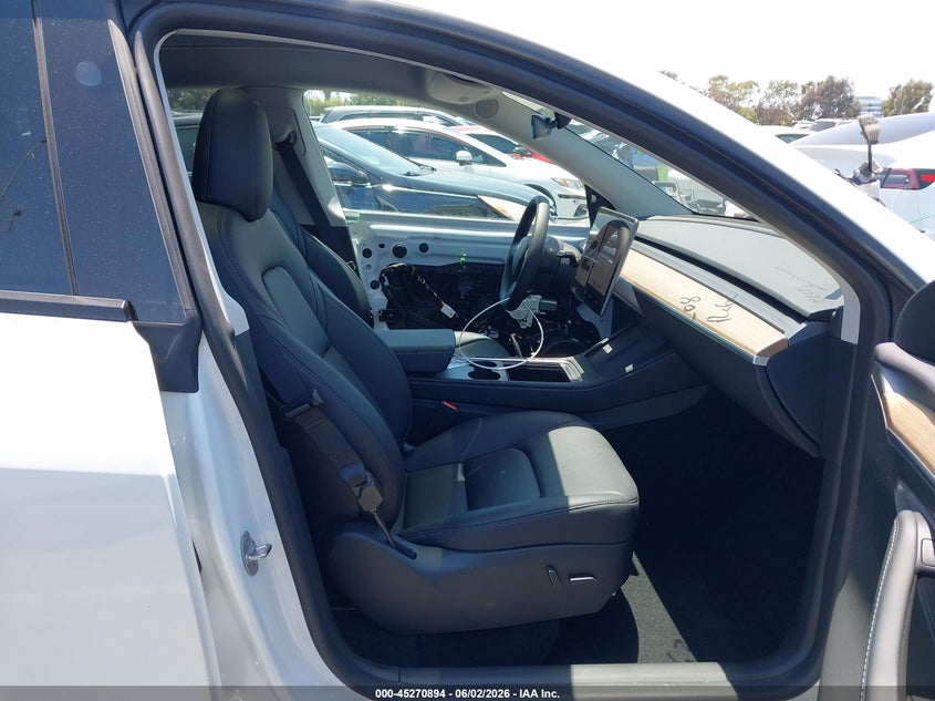 2023 Tesla Model y VIN 7SAYGDEFXPF889701 IAAI salvage auction — LEFT FRONT, Salvage Title, sold $13,100 on 2026-07-10 (photo 5)