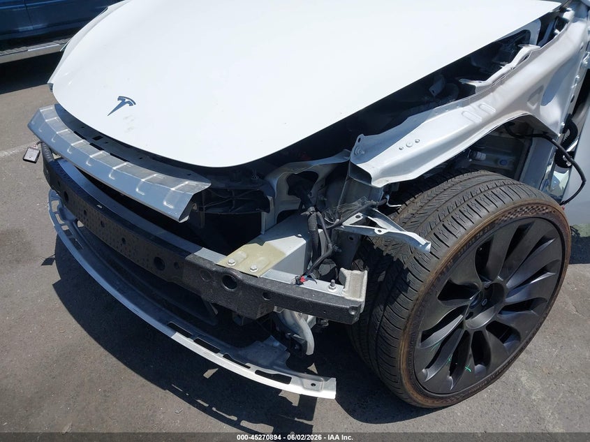 2023 Tesla Model y VIN 7SAYGDEFXPF889701 IAAI salvage auction — LEFT FRONT, Salvage Title, sold $13,100 on 2026-07-10 (photo 6)