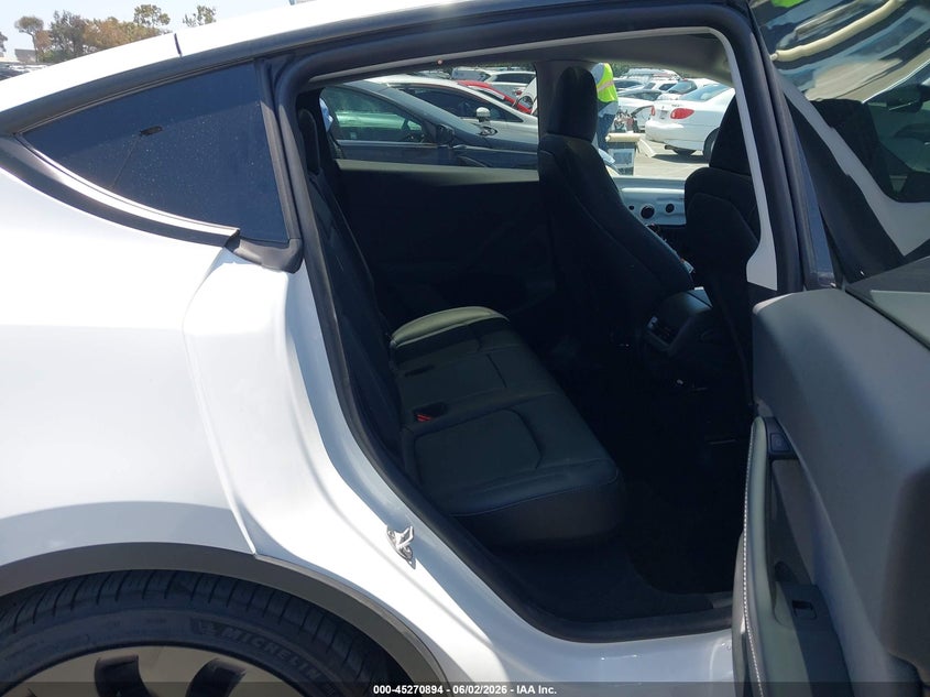 2023 Tesla Model y VIN 7SAYGDEFXPF889701 IAAI salvage auction — LEFT FRONT, Salvage Title, sold $13,100 on 2026-07-10 (photo 8)