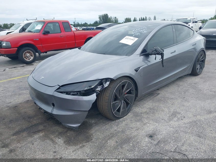 2024 Tesla Model 3 VIN 5YJ3E1ET8RF862713 IAAI salvage auction — SIDE, Salvage Title, sold $15,700 on 2026-09-03 (photo 2)