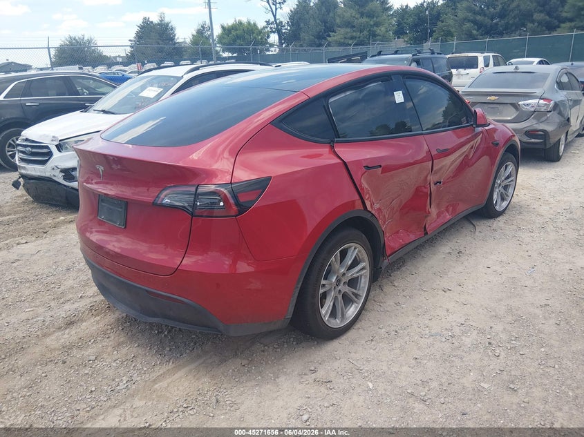 2023 Tesla Model y VIN 7SAYGDED2PF955964 IAAI salvage auction — RIGHT SIDE, Salvage Title, sold $7,800 on 2026-09-10 (photo 4)
