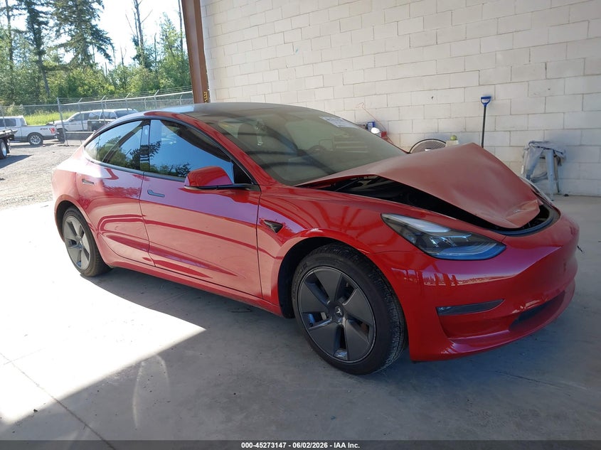 2022 Tesla Model 3 VIN 5YJ3E1EB3NF122990 IAAI salvage auction — FRONT & REAR, Salvage Title, sold $7,200 on 2026-07-09 (photo 1)