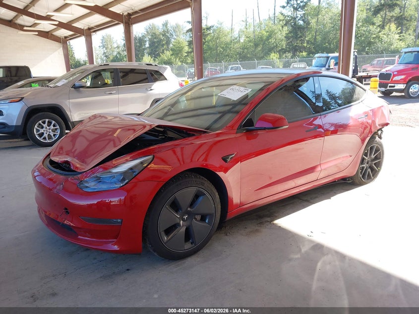 2022 Tesla Model 3 VIN 5YJ3E1EB3NF122990 IAAI salvage auction — FRONT & REAR, Salvage Title, sold $7,200 on 2026-07-09 (photo 2)