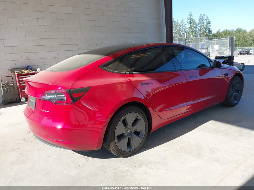 2022 Tesla Model 3 VIN 5YJ3E1EB3NF122990 IAAI salvage auction — FRONT & REAR, Salvage Title, sold $7,200 on 2026-07-09 (photo 4)