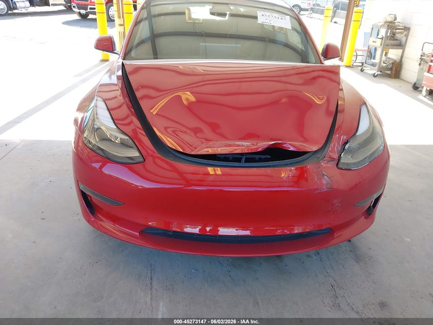2022 Tesla Model 3 VIN 5YJ3E1EB3NF122990 IAAI salvage auction — FRONT & REAR, Salvage Title, sold $7,200 on 2026-07-09 (photo 6)