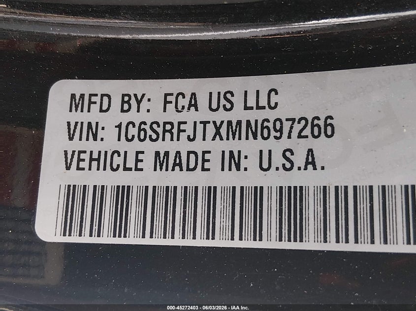 2021 Ram 1500 VIN 1C6SRFJTXMN697266 IAAI salvage auction — REAR END, Salvage Title, sold $11,000 on 2026-07-23 (photo 9)