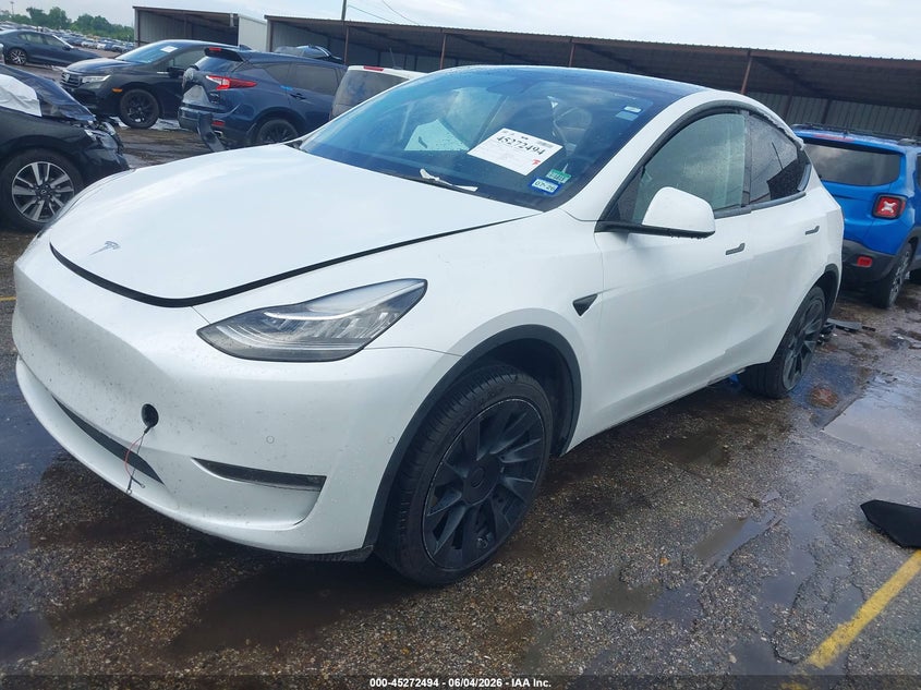 2021 Tesla Model y VIN 5YJYGDEEXMF306236 IAAI salvage auction — UNDERCARRIAGE, Original (Texas), sold $7,300 on 2026-07-30 (photo 2)