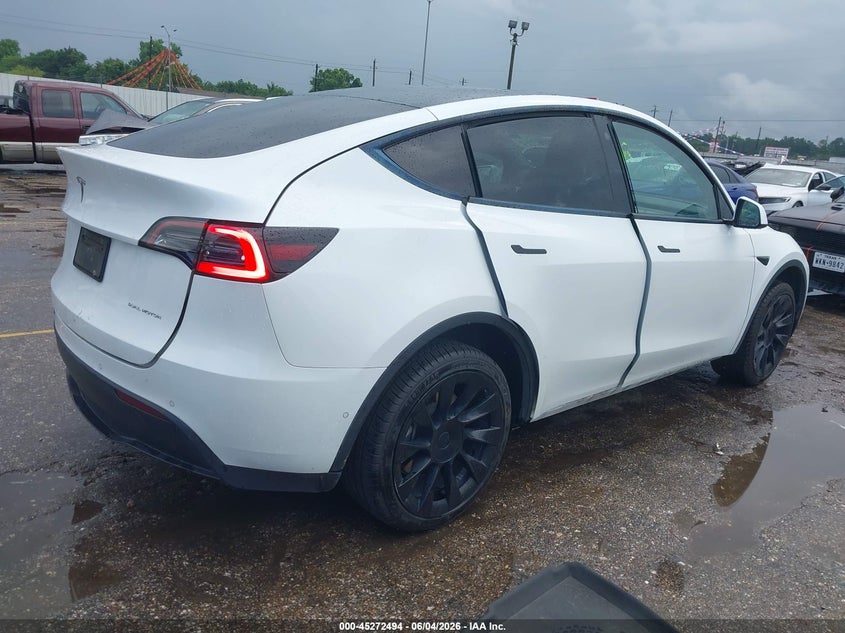 2021 Tesla Model y VIN 5YJYGDEEXMF306236 IAAI salvage auction — UNDERCARRIAGE, Original (Texas), sold $7,300 on 2026-07-30 (photo 4)