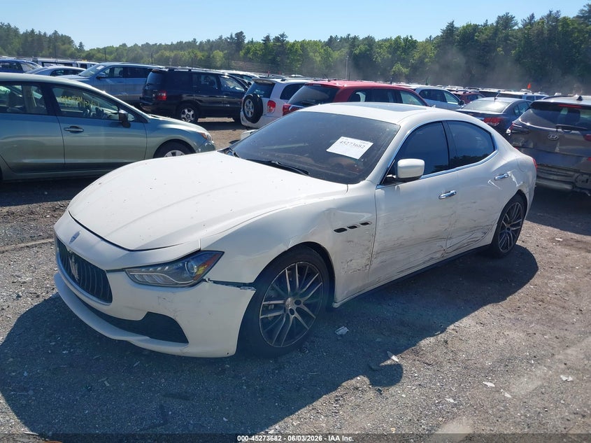 2015 Maserati Ghibli VIN ZAM57XSA1F1162069 IAAI salvage auction — SIDE, Reconstructed (Massachusetts), sold $1,700 on 2026-07-24 (photo 2)