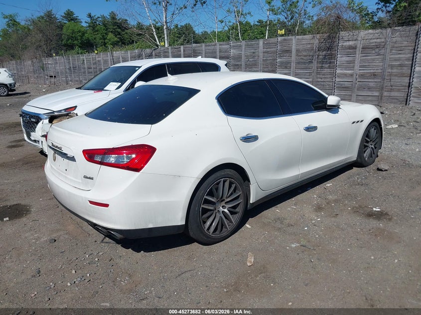 2015 Maserati Ghibli VIN ZAM57XSA1F1162069 IAAI salvage auction — SIDE, Reconstructed (Massachusetts), sold $1,700 on 2026-07-24 (photo 4)
