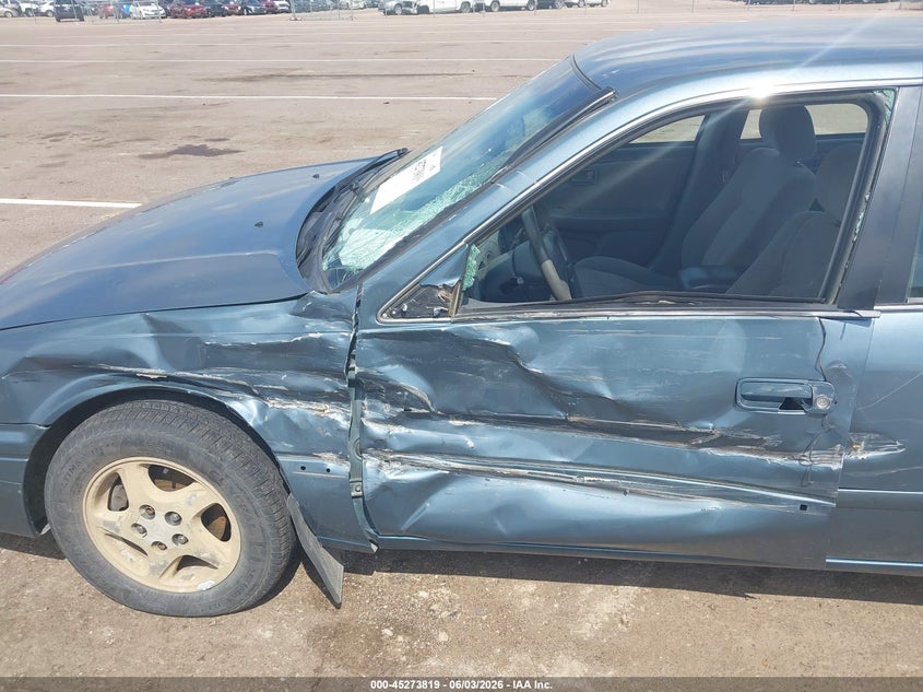 2001 Toyota Camry VIN JT2BG22K410598487 IAAI salvage auction — SIDE, Regular (South Dakota), sold $400 on 2026-07-14 (photo 6)