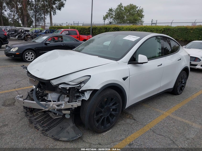 2022 Tesla Model y VIN 7SAYGDEE3NF433723 IAAI salvage auction — FRONT & REAR, Salvage Title, sold $8,775 on 2026-07-14 (photo 2)