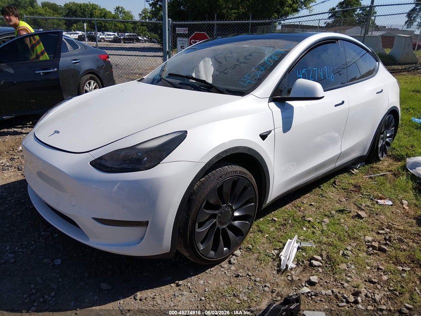 2022 Tesla Model y VIN 7SAYGDEF0NF524473 IAAI salvage auction — RIGHT REAR, Salvage Title, sold $5,600 on 2026-07-23 (photo 2)