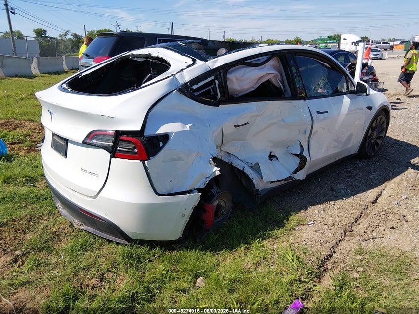 2022 Tesla Model y VIN 7SAYGDEF0NF524473 IAAI salvage auction — RIGHT REAR, Salvage Title, sold $5,600 on 2026-07-23 (photo 4)