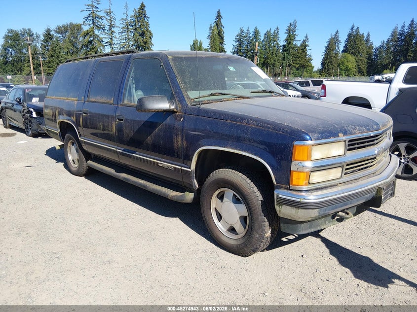 1999 Chevrolet Suburban 1500 VIN 3GNFK16RXXG258975 — IAAI salvage auction photo