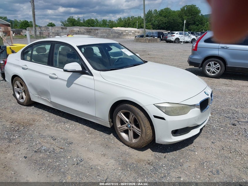 2014 BMW VIN WBA3B1C5XEK134012 IAAI salvage auction — NORMAL WEAR, Salvage Title, sold $325 on 2026-07-17 (photo 1)