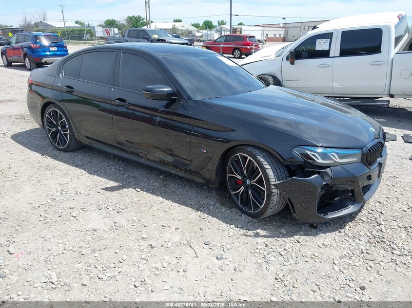 2022 BMW M550i xDrive VIN WBA13BK09NCK21703 — IAAI salvage auction photo