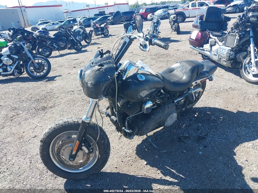 2013 Harley-davidson Fat bob VIN 1HD1GYM17DC333803 IAAI salvage auction — SIDE, Salvage Title, sold $475 on 2026-09-08 (photo 2)
