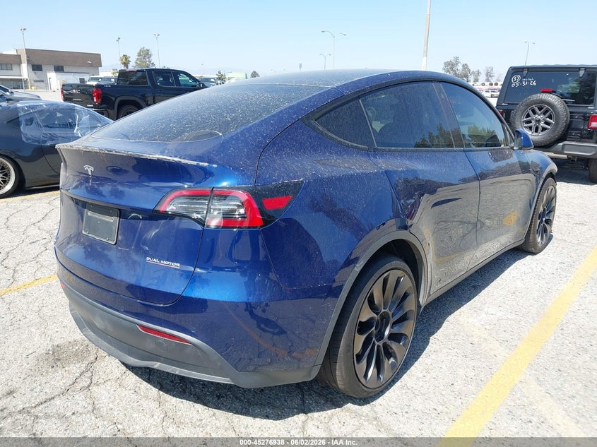 2022 Tesla Model y VIN 7SAYGDEFXNF390202 IAAI salvage auction — FRONT END, Salvage Title, sold $11,125 on 2026-07-14 (photo 4)