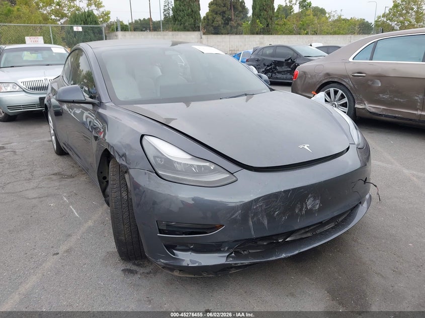 2023 Tesla Model 3 VIN 5YJ3E1EA5PF496737 IAAI salvage auction — LEFT REAR, Salvage Title, sold $3,600 on 2026-07-09 (photo 1)