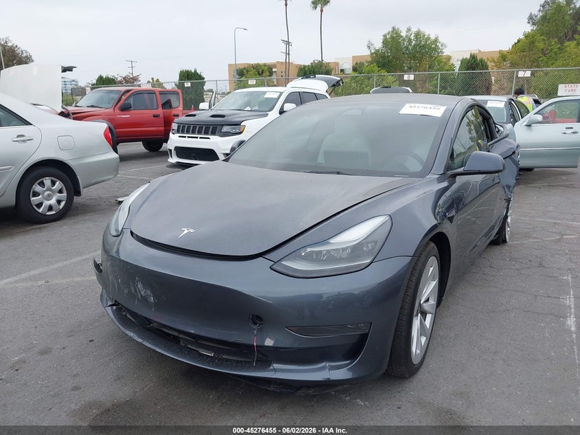 2023 Tesla Model 3 VIN 5YJ3E1EA5PF496737 IAAI salvage auction — LEFT REAR, Salvage Title, sold $3,600 on 2026-07-09 (photo 2)
