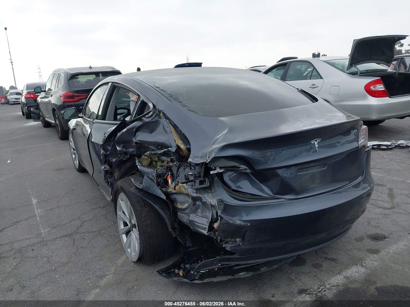 2023 Tesla Model 3 VIN 5YJ3E1EA5PF496737 IAAI salvage auction — LEFT REAR, Salvage Title, sold $3,600 on 2026-07-09 (photo 3)