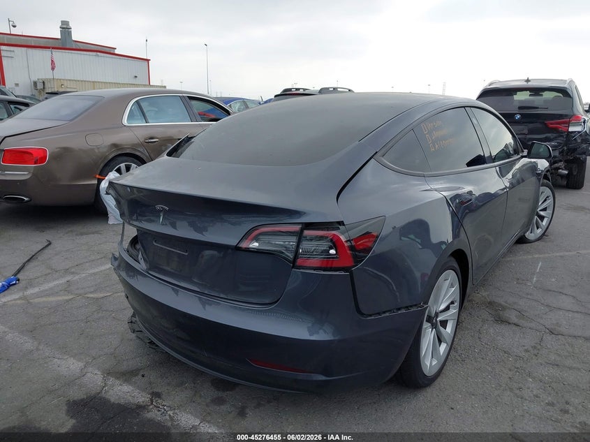 2023 Tesla Model 3 VIN 5YJ3E1EA5PF496737 IAAI salvage auction — LEFT REAR, Salvage Title, sold $3,600 on 2026-07-09 (photo 4)