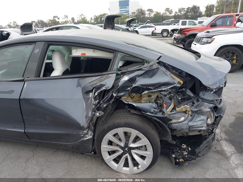 2023 Tesla Model 3 VIN 5YJ3E1EA5PF496737 IAAI salvage auction — LEFT REAR, Salvage Title, sold $3,600 on 2026-07-09 (photo 6)