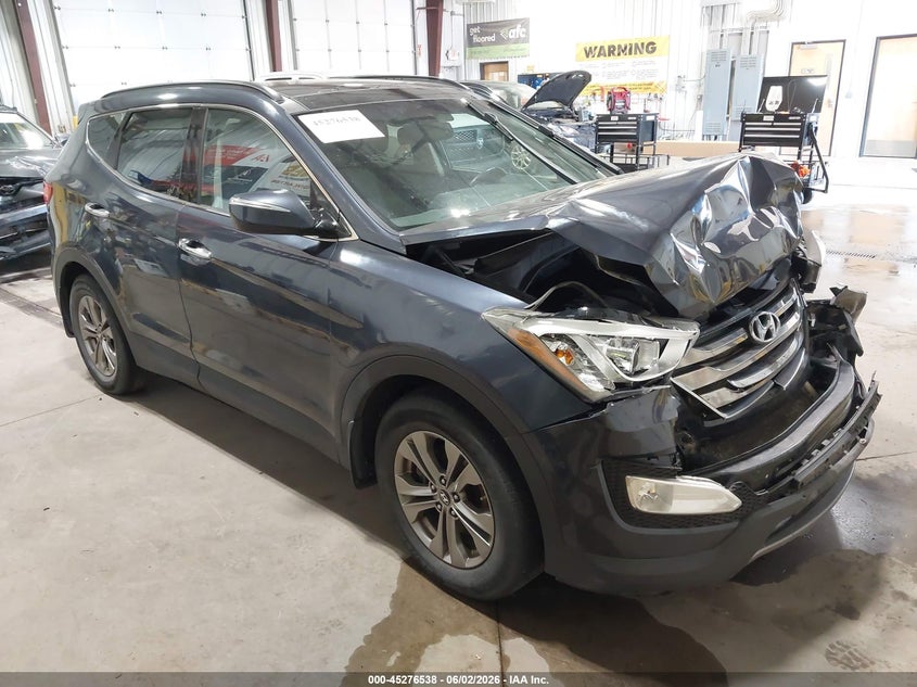 2014 Hyundai Santa fe VIN 5XYZU3LB2EG155239 IAAI salvage auction — FRONT END, Prior Salvage (Minnesota), sold $675 on 2026-07-24 (photo 1)